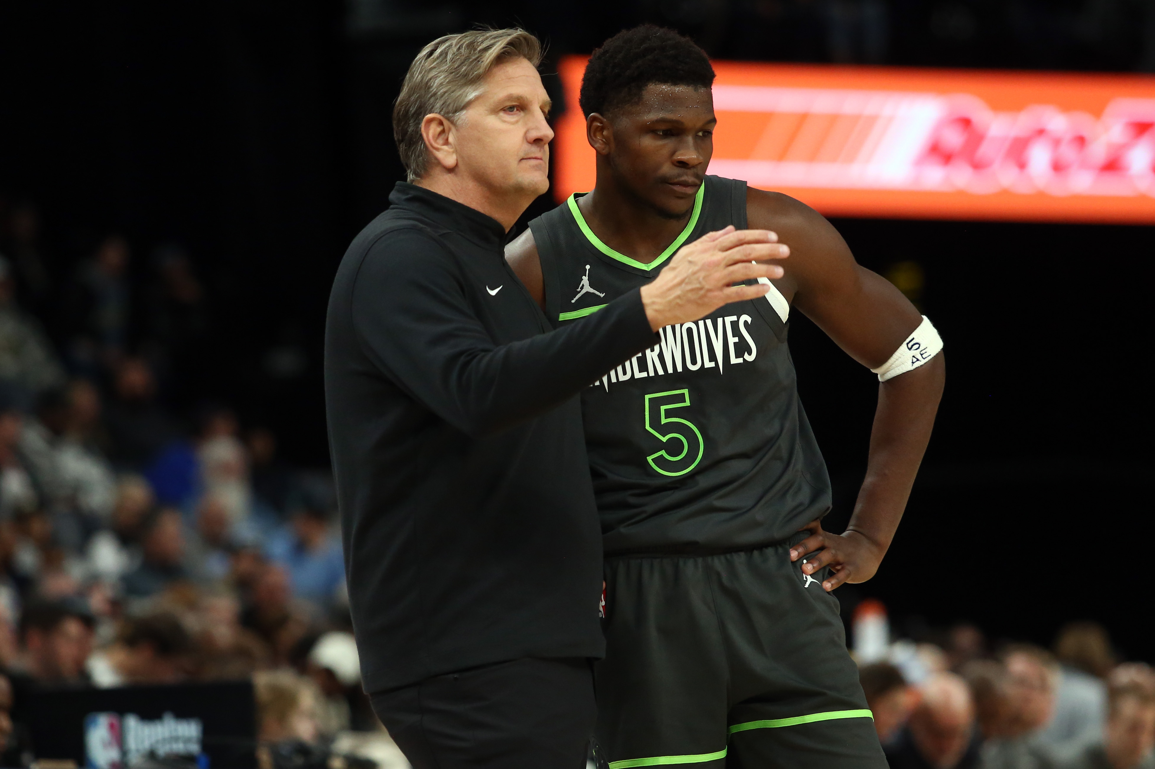 Nov 26, 2023; Memphis, Tennessee, USA; Minnesota Timberwolves head coach Chris Finch talks with Minnesota Timberwolves guard Anthony Edwards (5) during the first half against the Memphis Grizzlies at FedExForum.